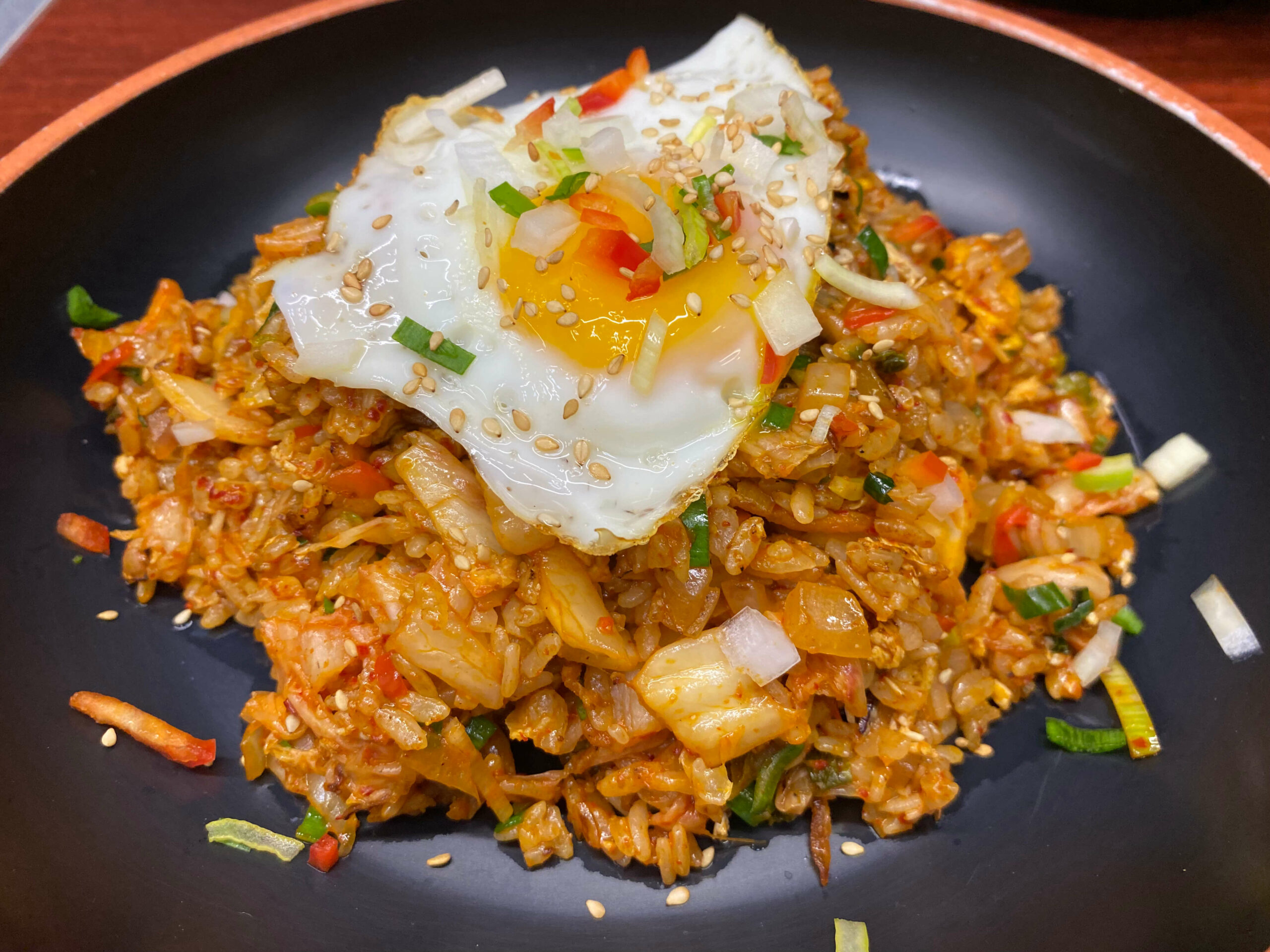 Kimchi Fried Rice topped with a sunny side egg